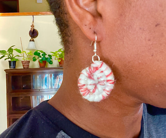 Peppermint candy earrings Rope wrapped in white and red yarn giving a peppermint candy look  Materials: yarn, rope, nickel free hooks