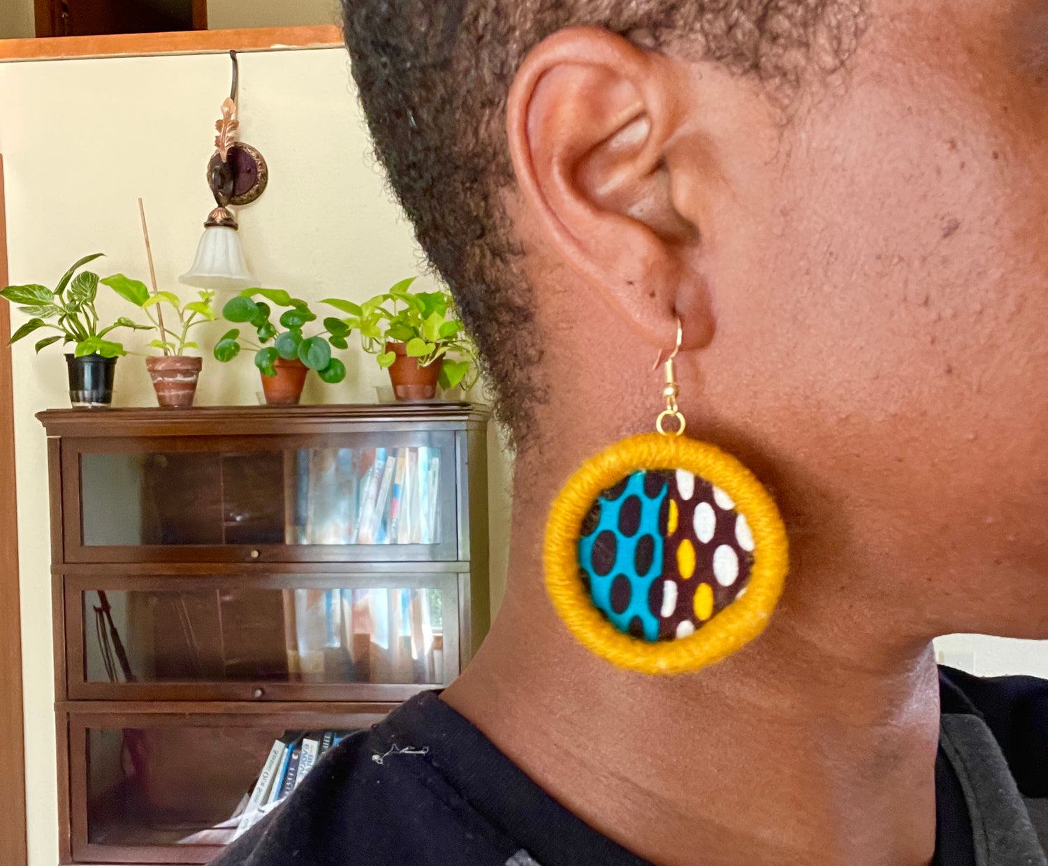 Yellow teal and brown earrings Teal Brown and Yellow Print African fabric with rope wrapped in yellow yarn on the border  Materials: African wax fabric, rope, yarn, hot glue